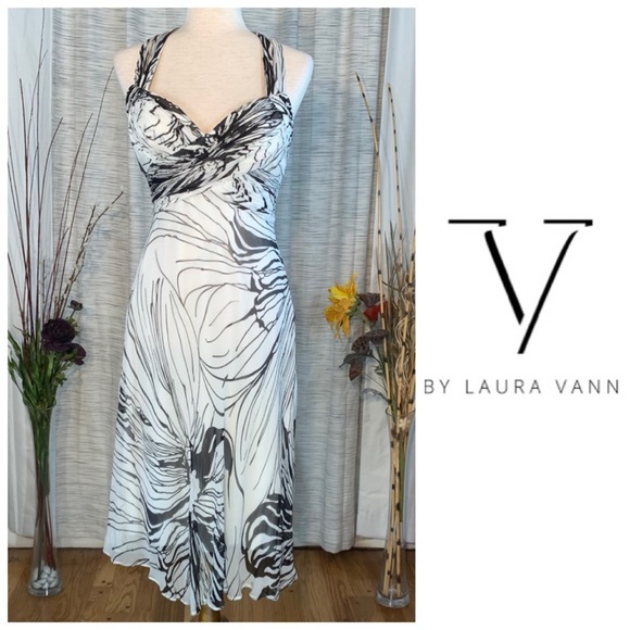 Laura Vann Dresses & Skirts - Laura Vann white with black flowers halter A-line dress.
